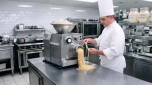 commercial-pasta-extruder-machine-in-a-restaurant-kitchen
